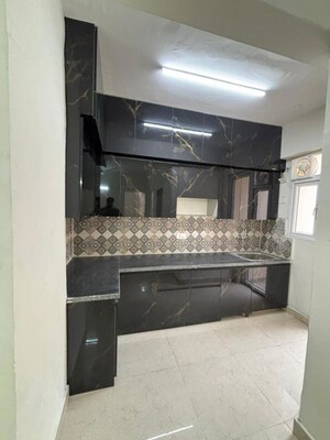 Kitchen in 2 BHK Apartment at Signature The Millennia 3, Sector 37d – for Rent