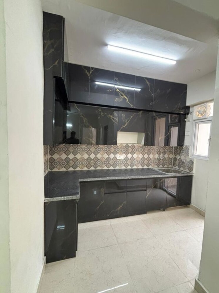 Kitchen, signature-the-millennia-3 2 Bedroom 687 Sq.Ft. Apartment In Sector 37d Gurgaon 9788147