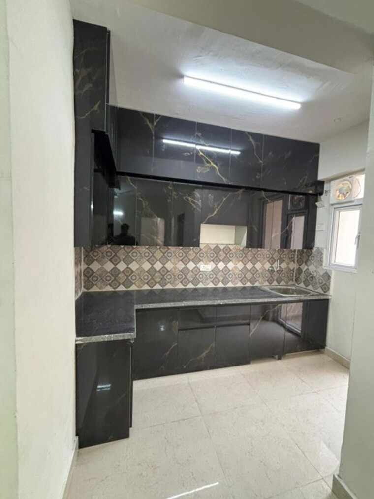 Kitchen, signature-the-millennia-3 2 Bedroom 687 Sq.Ft. Apartment In Sector 37d Gurgaon 9788147