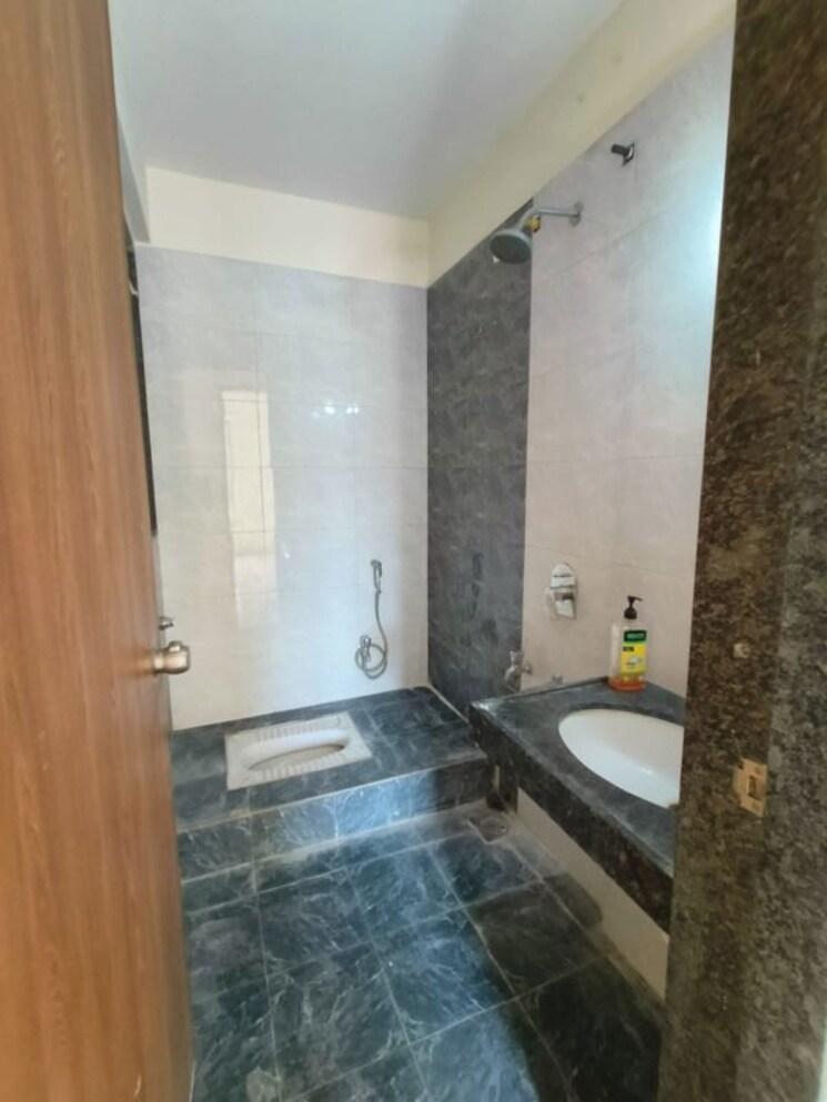 Bathroom, pristine-equilife-homes 2 Bedroom 588 Sq.Ft. Apartment In Mahalunge Ingale Pune 9788224