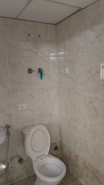 Bathroom in 2 BHK Apartment at Amrapali Pan Oasis, Sector 70 – for Sale