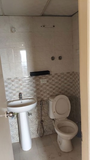 Bathroom in 2 BHK Apartment at Amrapali Pan Oasis, Sector 70 – for Sale