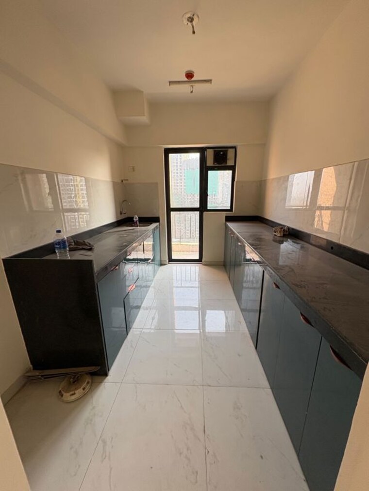 Kitchen, runwal-gardens-phase-i 3 Bedroom 904 Sq.Ft. Apartment In Dombivli East Thane 9788262