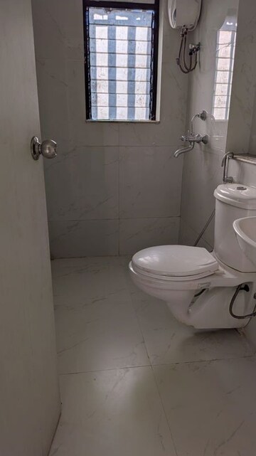 Bathroom in 1 BHK Apartment at Runwal Gardens Phase I, Dombivli East – for Sale
