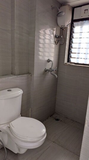 Bathroom in 1 BHK Apartment at Runwal Gardens Phase I, Dombivli East – for Sale