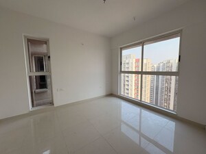 Room in 2.5 BHK Apartment at Lodha Codename Premier, Mangaon – for Sale