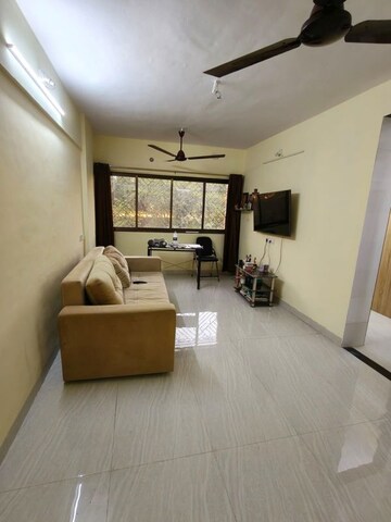 Living Room in 1 BHK Apartment at Asmita Jyoti CHS, Malad West – for Rent