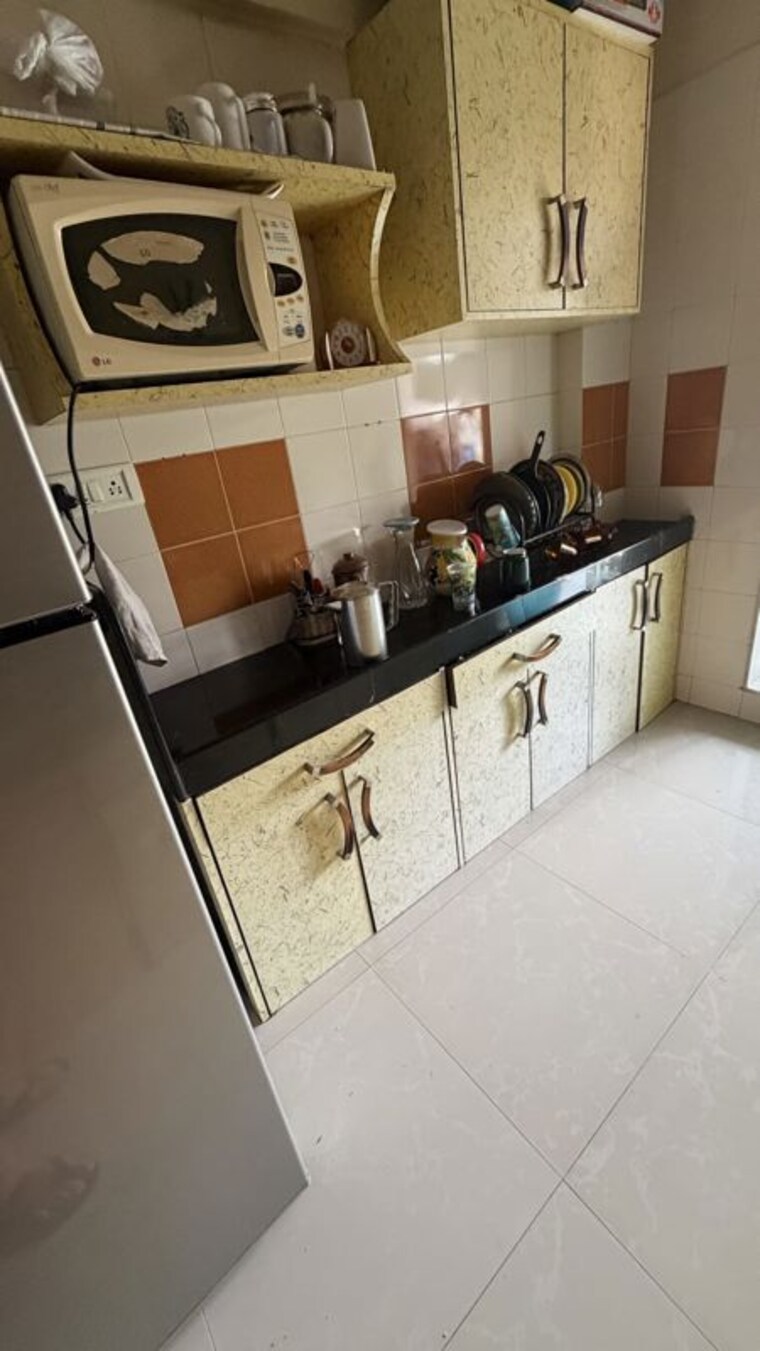 Kitchen, etco-eco-heights 2 Bedroom 800 Sq.Ft. Apartment In Andheri East Mumbai 9788474