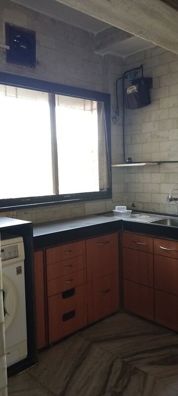 Kitchen in 2.5 BHK Apartment at Savera CHS Andheri, Andheri West – for Rent