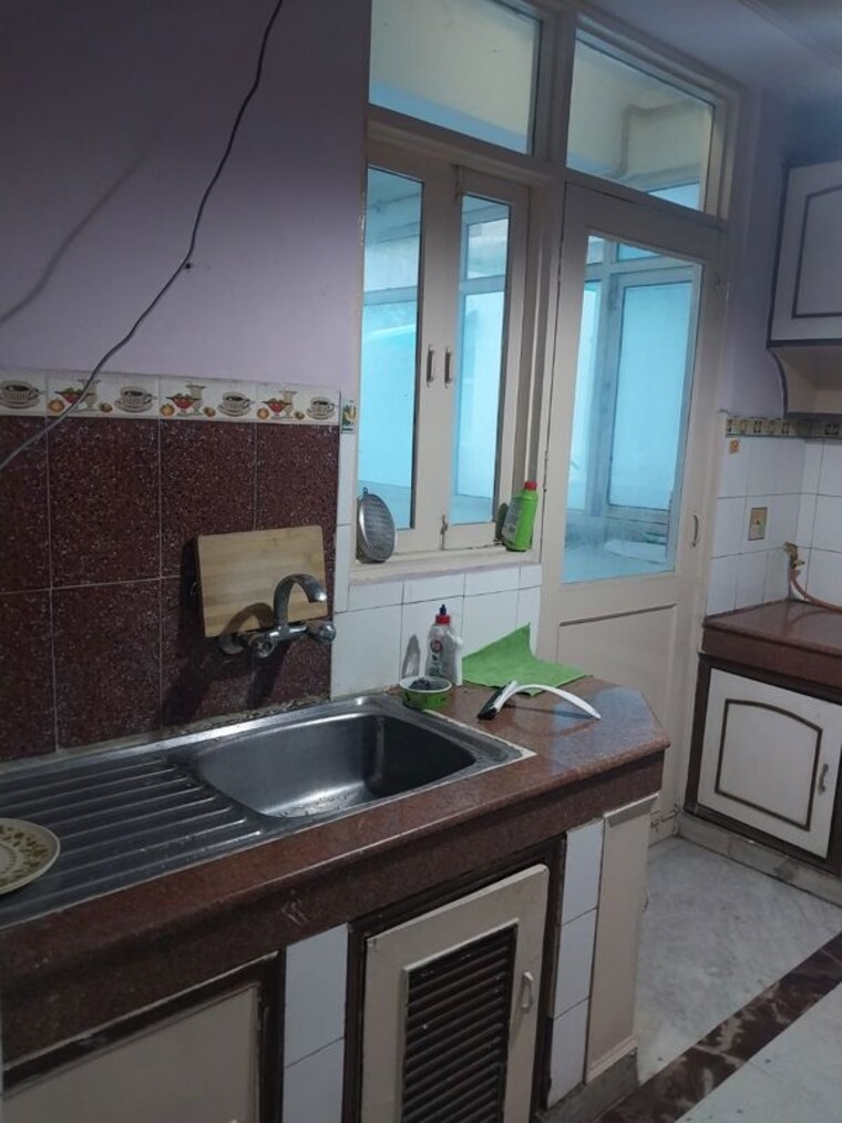 Kitchen, sector 18 dwarka 3 Bedroom 1500 Sq.Ft. Apartment In Sector 18 Dwarka Delhi 9788519