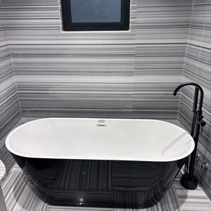 Bathroom in 4 BHK Builder Floor at Green Park Extension – for Sale