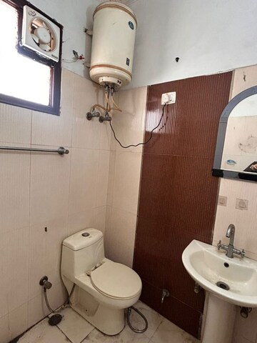 Bathroom in 4 BHK Apartment at Sarita Vihar – for Sale