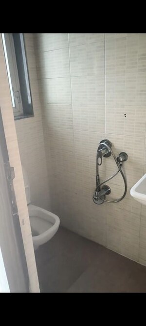 Bathroom in 3 BHK Apartment at Omkar Vayu, Mahim – for Rent