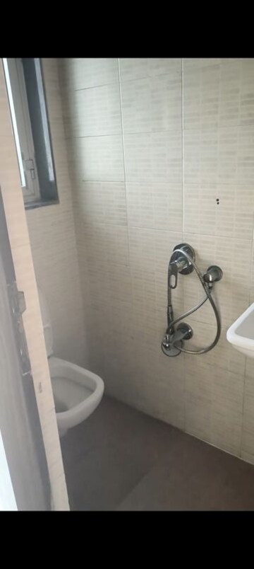 Bathroom in 3 BHK Apartment at Omkar Vayu, Mahim – for Sale
