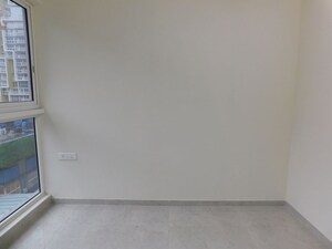 Room in 2.5 BHK Apartment at Hiranandani Cardinal, Ghodbunder Road – for Sale