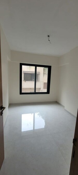 Bedroom in 2 BHK Apartment at Bhusari Colony – for Sale
