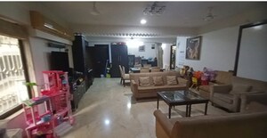 Living Room in 4 BHK Apartment at Santacruz West – for Sale