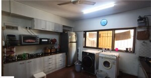 Kitchen in 4 BHK Apartment at Santacruz West – for Sale