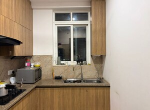 Kitchen in 2 BHK Apartment at Ambience Creacions, Sector 22 – for Rent