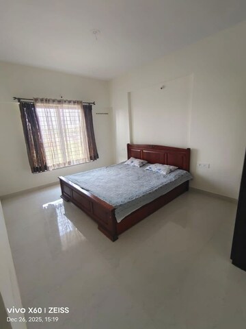 Bedroom in 2 BHK Apartment at Kumar Paradise Pune, Magarpatta City – for Rent