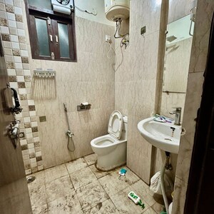 Bathroom in 2 BHK Builder Floor at Chattarpur – for Rent
