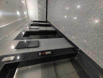 Lift in Studio Apartment at DAH Greentech NX Corporate Suites, Tech Zone 4 Greater Noida – for Rent