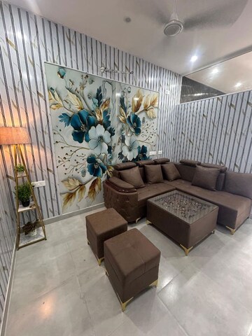 Living Room in Studio Apartment at DAH Greentech NX Corporate Suites, Tech Zone 4 Greater Noida – for Rent