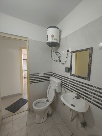 Bathroom in 2 BHK Apartment at Shree Vardhman Green Court, Sector 90 – for Rent