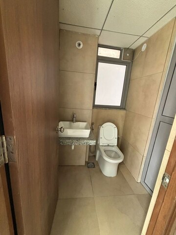 Bathroom in 2 BHK Apartment at Raymond Ten X Habitat, Pokhran Road No Two – for Rent