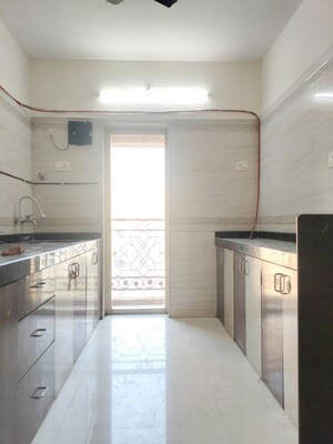 Kitchen in 3 BHK Apartment at Hiranandani Bloomingdale, Ghodbunder Road – for Rent
