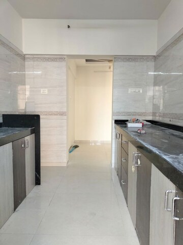 Kitchen in 3 BHK Apartment at Hiranandani Bloomingdale, Ghodbunder Road – for Rent