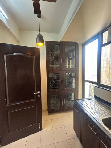 Kitchen in 3 BHK Apartment at Unitech Uniworld Gardens 2, Sector 47 – for Rent