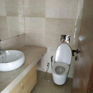 Bathroom in 4 BHK Apartment at Omkar 1973, Century Bazar – for Rent