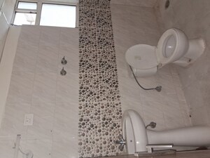 Bathroom in 3 BHK Apartment at Proview Officer City, Raj Nagar Extension – for Rent