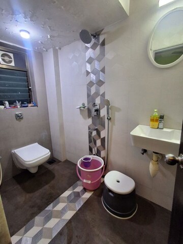 Bathroom in 1 BHK Apartment at Royal Galaxy, Ulhasnagar – for Sale