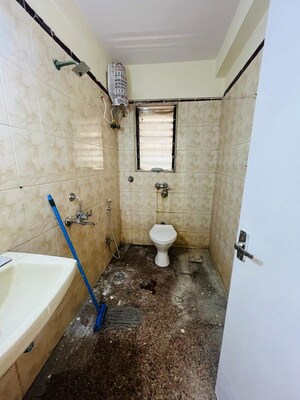 Bathroom in 2 BHK Apartment at Satellite Garden, Goregaon East – for Rent