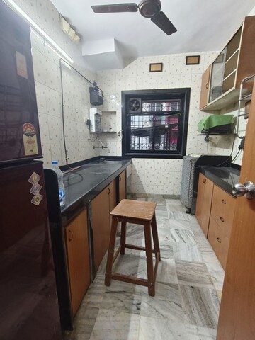 Kitchen in 2 BHK Apartment at Jamuna Darshan CHS, Goregaon West – for Rent