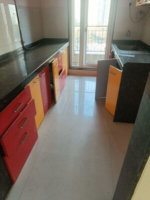 Kitchen in 2 BHK Apartment at Rustomjee Urbania Azziano, Thane West – for Rent