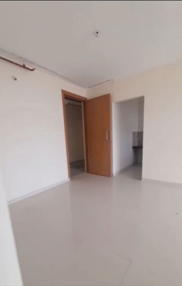 Living Room in 1 BHK Apartment at Adhiraj Samyama, Kharghar Sector 37 – for Rent