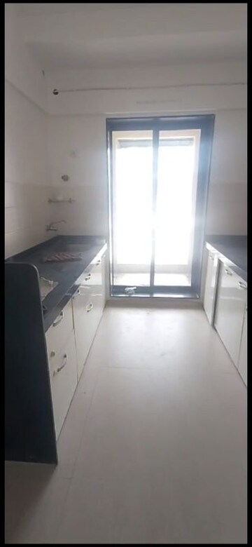 Kitchen in 2 BHK Apartment at Vini Towers, Malad West – for Sale