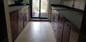 Kitchen in 4 BHK Apartment at Vini Towers, Malad West – for Sale