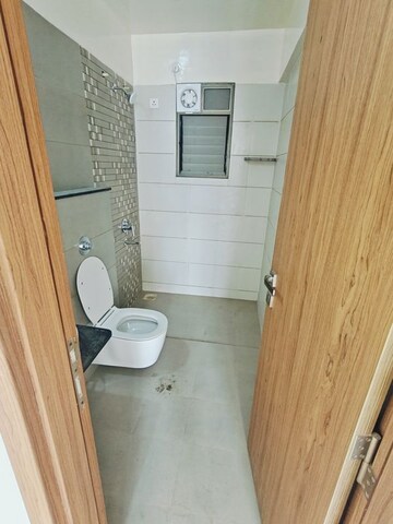 Bathroom in 2 BHK Apartment at Majestique Towers, Kharadi – for Rent