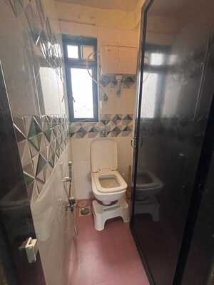 Bathroom in 2 BHK Apartment at Sameer Apartments, Andheri West – for Rent