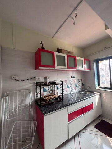 Kitchen in 2 BHK Apartment at Sameer Apartments, Andheri West – for Rent