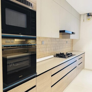 Kitchen in 4 BHK Apartment at Rustomjee Crown, Gokhale Road – for Rent