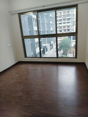 Room in 2 BHK Apartment at Raj Infinia, Malad West – for Rent