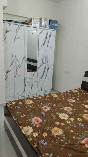 Master Bedroom in 2 BHK Apartment at Kolte Patil R10, Hinjewadi – for Rent