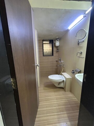 Bathroom in 2 BHK Apartment at Juhu Natraj CHS, Vile Parle West – for Rent