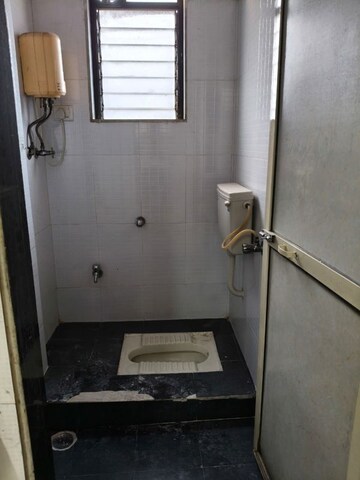 Bathroom in 1 BHK Apartment at Pacific Towers, Nerul Sector 27 – for Rent