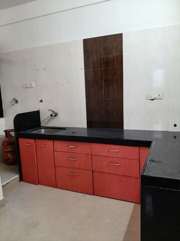 Kitchen in 1 BHK Apartment at Pacific Towers, Nerul Sector 27 – for Rent